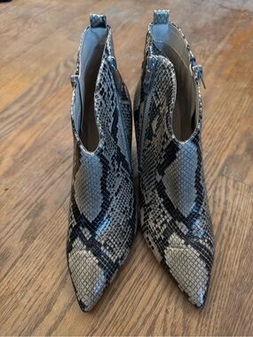 Snake print leather booties